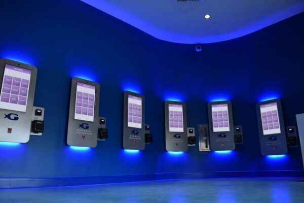 digital wall mounted kiosks in an aquarium
